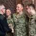 Members of the U.S. Navy Band participate in a reenlistment ceremony