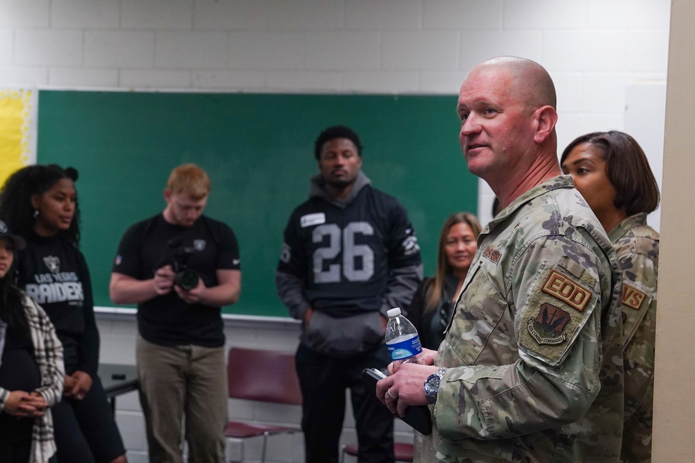 Las Vegas Raiders and Nellis Airmen give out Christmas Trees