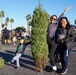 Las Vegas Raiders and Nellis Airmen give out Christmas trees