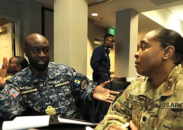 Commander Mark Peterson, Barbados Defense Force lead planner dialogues with Lt. Col. Cathy Alston, Army South Lead Gender Focal Point