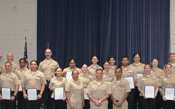 31 Sailors recently selected for advancement and promoted to the next rank.