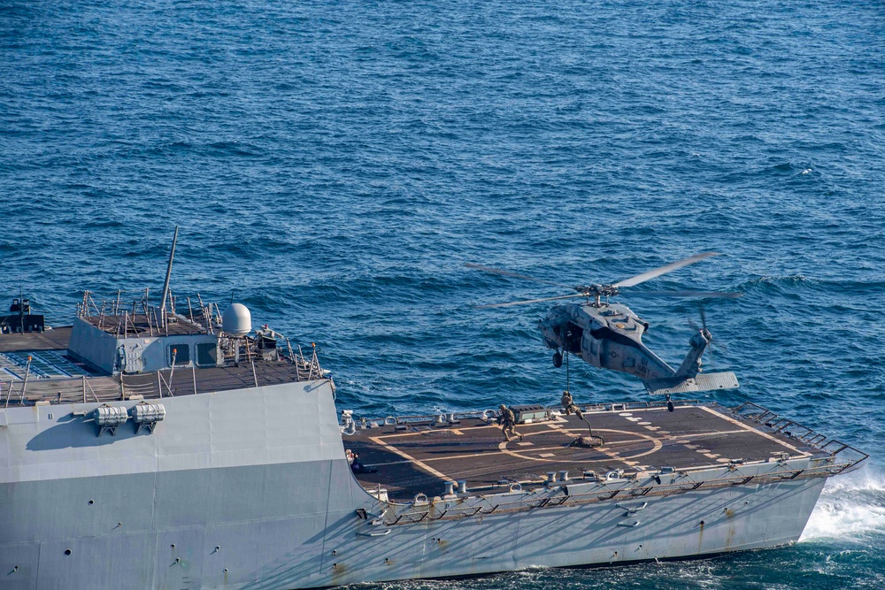 U.S. Navy Explosive Ordnance Disposal Technicians Conduct Helicopter Rope Suspension Drills