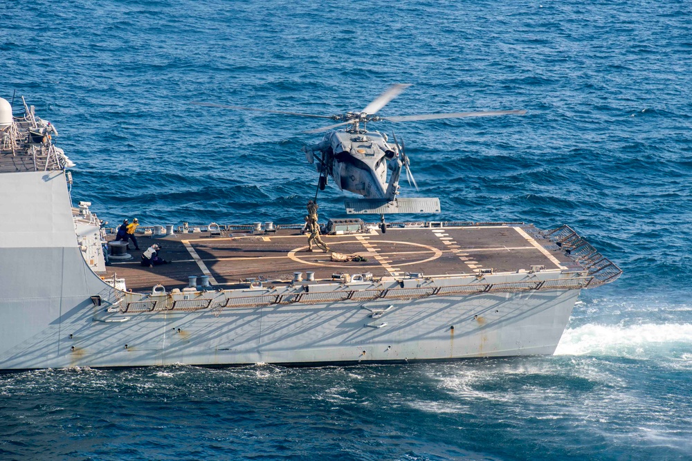 U.S. Navy Explosive Ordnance Disposal Technicians Conduct Helicopter Rope Suspension Drills