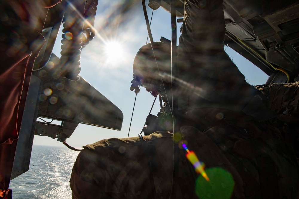 U.S. Navy Explosive Ordnance Disposal Technicians Conduct Helicopter Rope Suspension Drills