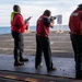 Abraham Lincoln Sailors participate in a live-fire exercise