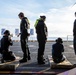 Abraham Lincoln Sailors participate in a live-fire exercise