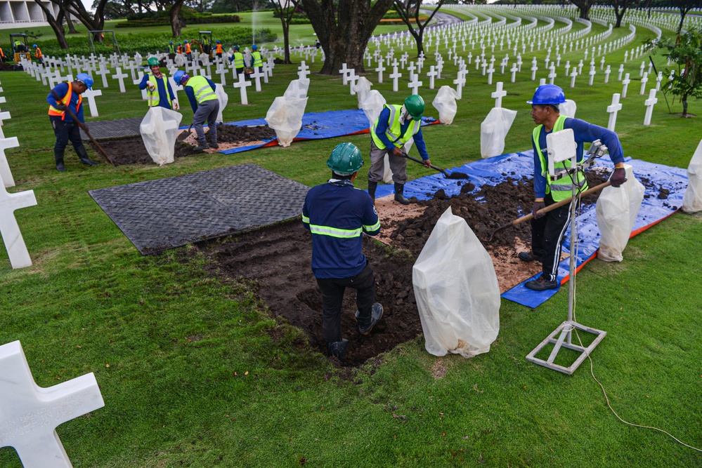 DPAA and ABMC Personnel Conduct Disinterment Operations