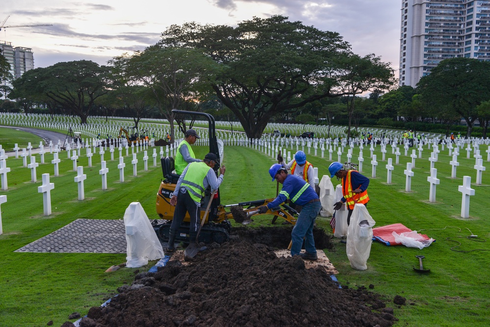 DPAA and ABMC Personnel Conduct Disinterment Operations