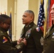 Maj. Gen. David Wilson presents Sgt. Maj. Felix Lassus with the Legion of Merit