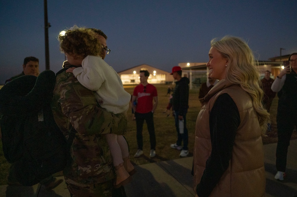 317th AW Airmen return from mission