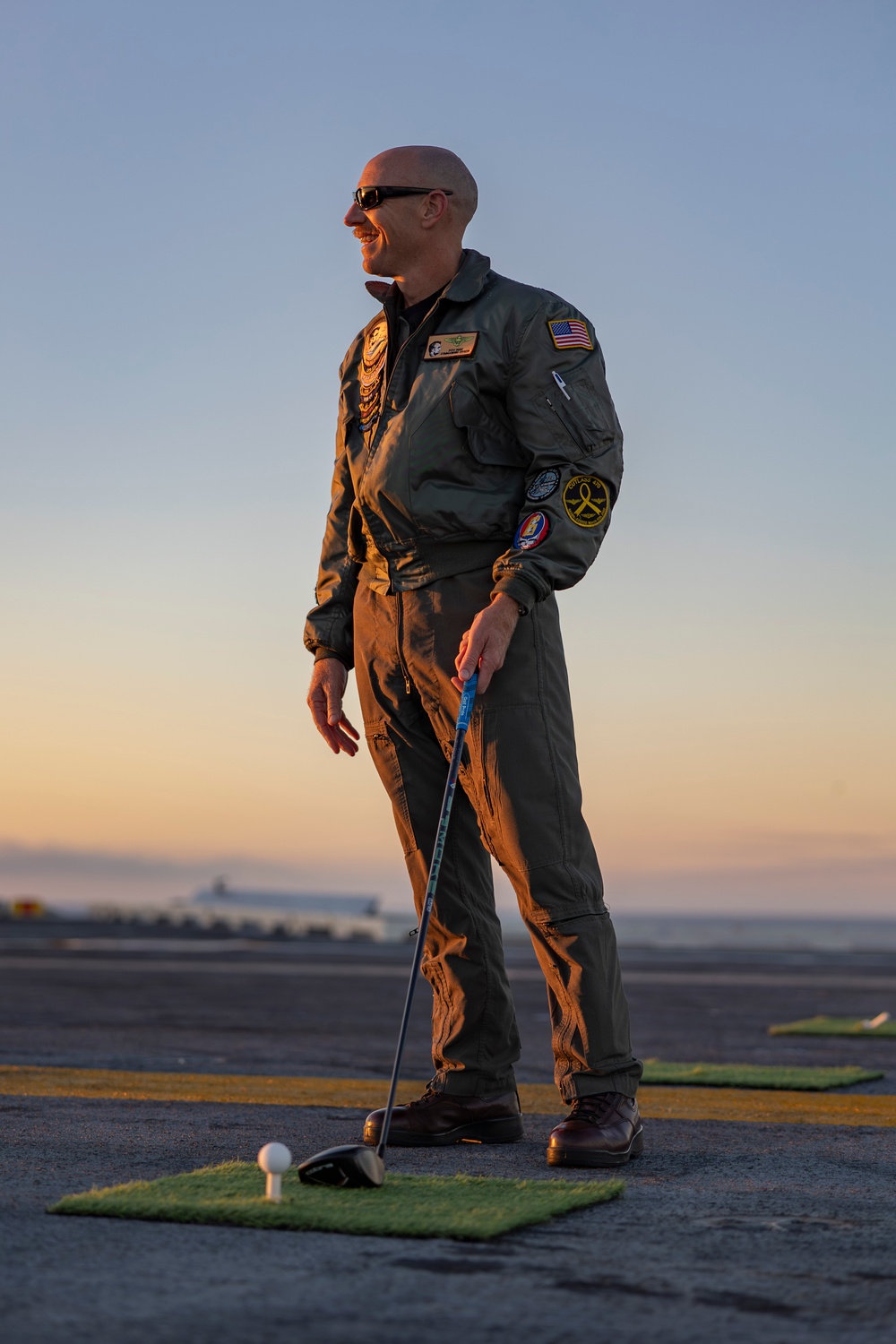 Abraham Lincoln Sailors golf on the flight deck