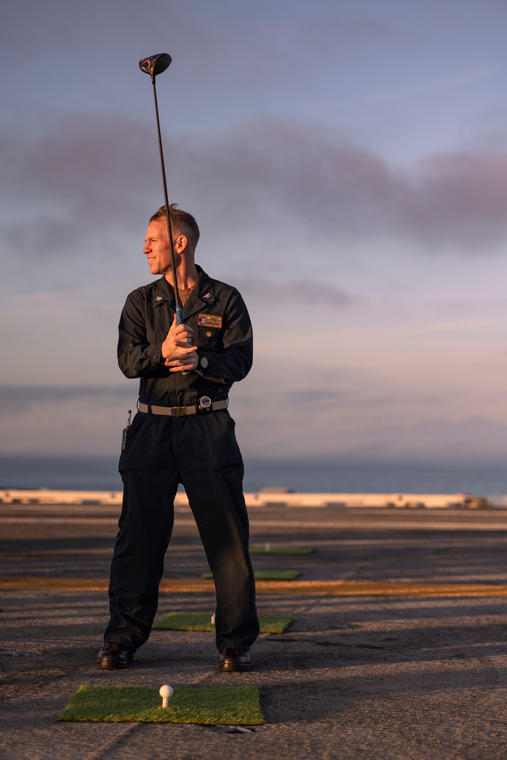 Abraham Lincoln Sailors golf on the flight deck