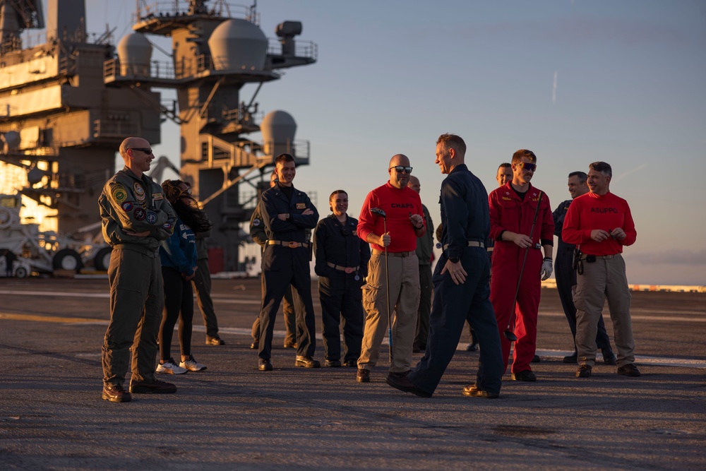 Abraham Lincoln Sailors golf on the flight deck