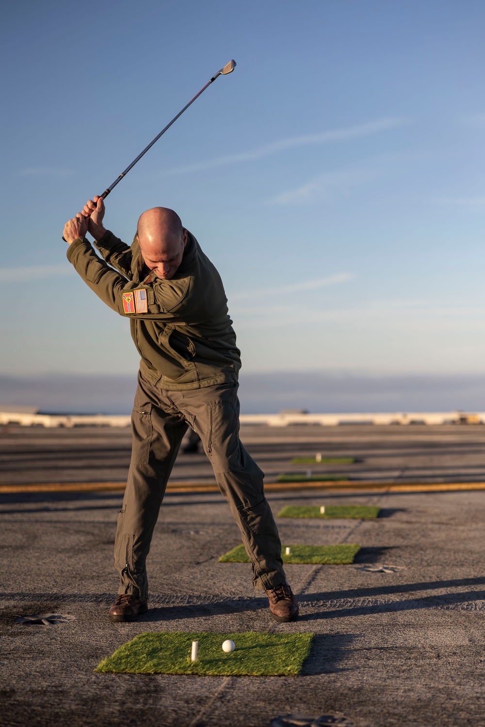 Abraham Lincoln Sailors golf on the flight deck