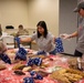 Annual Raider Holiday Cheer event provides gift bags to Airmen