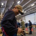 USS Ronald Reagan (CVN 76) Sailors move cargo