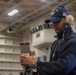 USS Ronald Reagan (CVN 76) Sailors move cargo