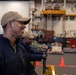 USS Ronald Reagan (CVN 76) Sailors move cargo