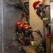 USS Ronald Reagan (CVN 76) conducts a joint damage control drill