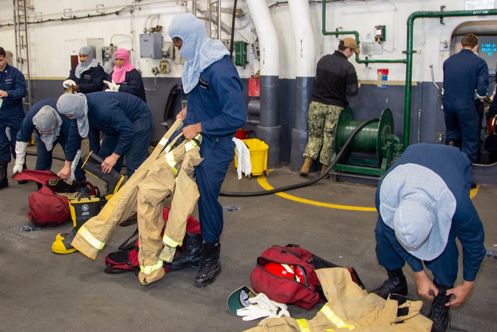 USS Ronald Reagan (CVN 76) conducts a joint damage control drill