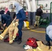 USS Ronald Reagan (CVN 76) conducts a joint damage control drill