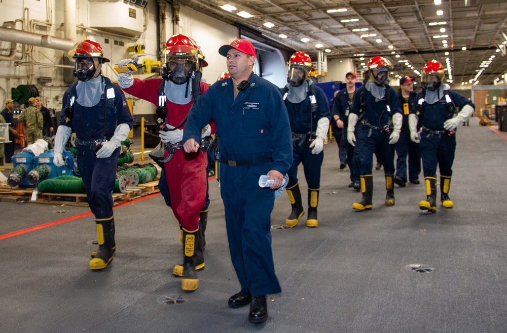 USS Ronald Reagan (CVN 76) conducts a joint damage control drill