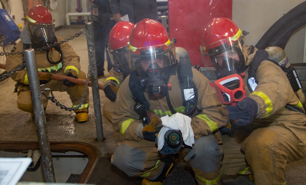 USS Ronald Reagan (CVN 76) conducts a joint damage control drill