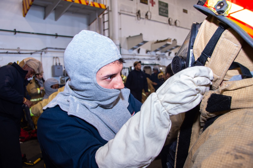 USS Ronald Reagan (CVN 76) conducts a joint damage control training drill