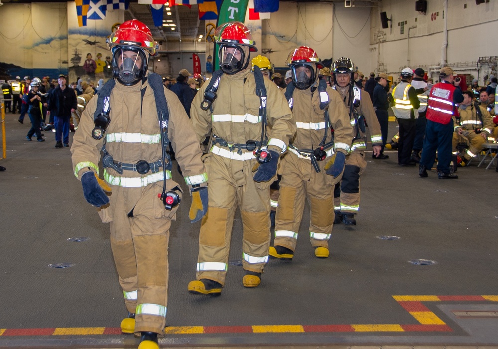 USS Ronald Reagan (CVN 76) conducts a joint damage control training drill