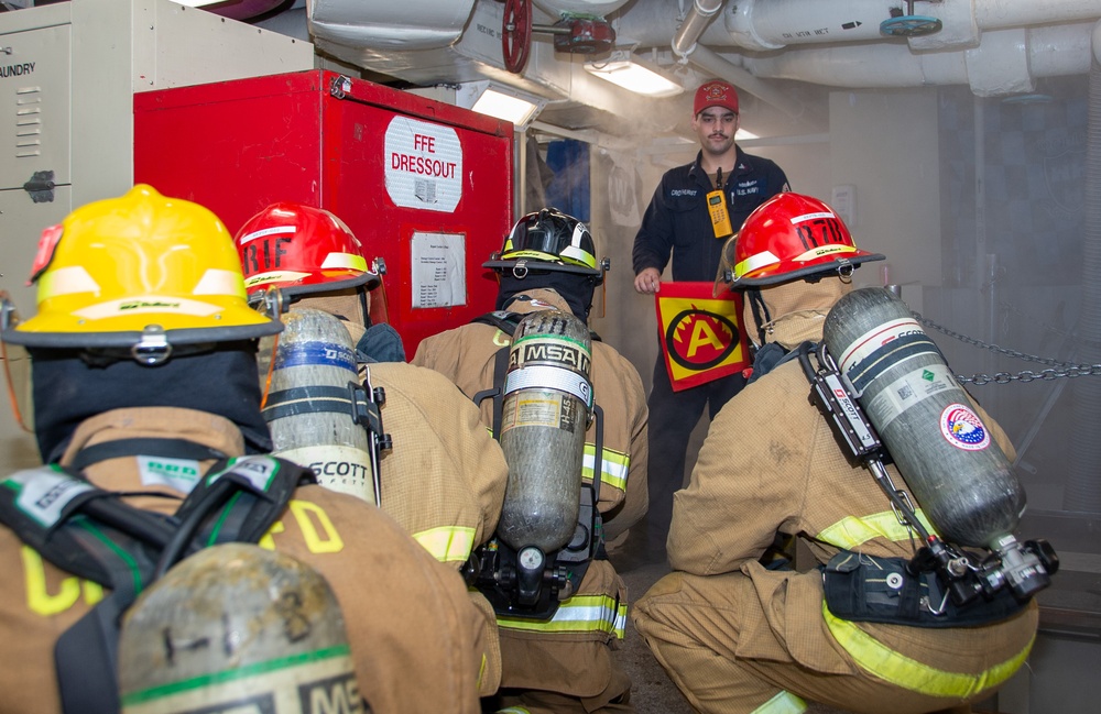 USS Ronald Reagan (CVN 76) conducts a joint damage control training drill