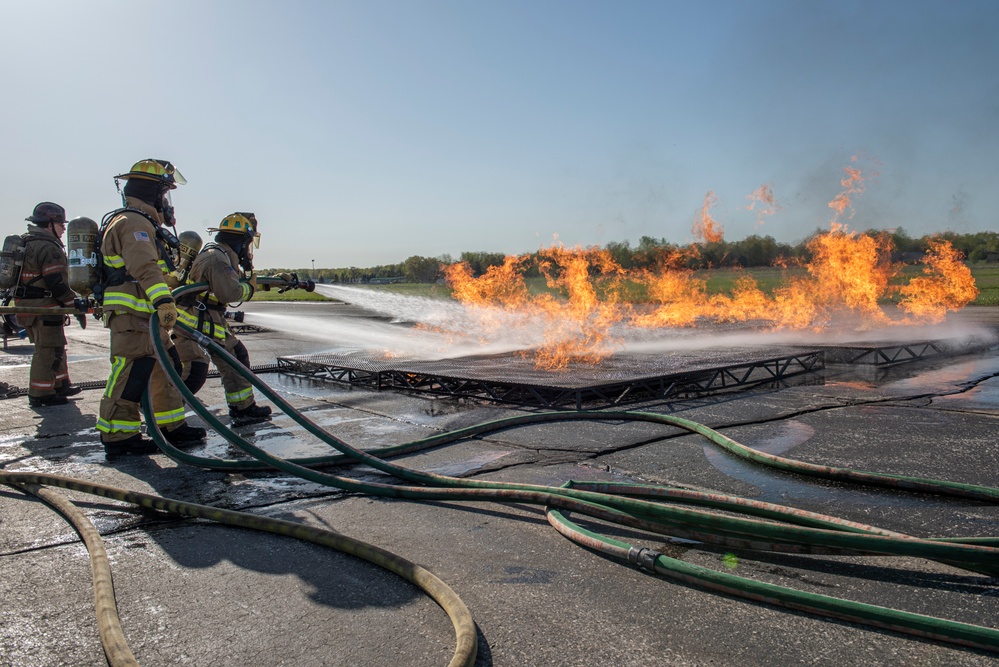 180FW Fire Protection Fights The Flames During Training Exercise