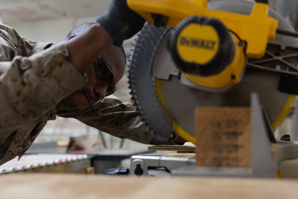 DMO Marines assist permanent personal with packaging and moving