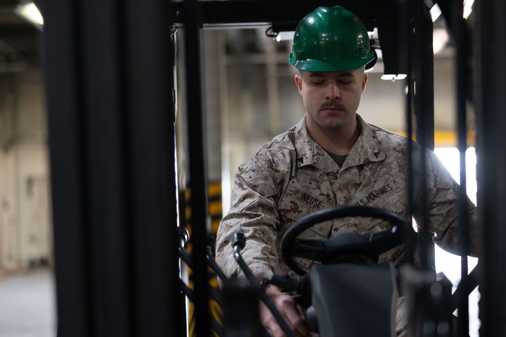 DMO Marines assist permanent personal with packaging and moving