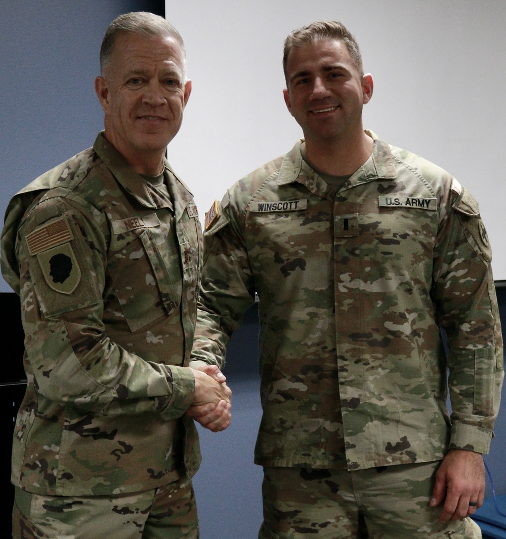 Adjutant General of Illinois 'Coins' Two National Guard Officers at Leader Engagement