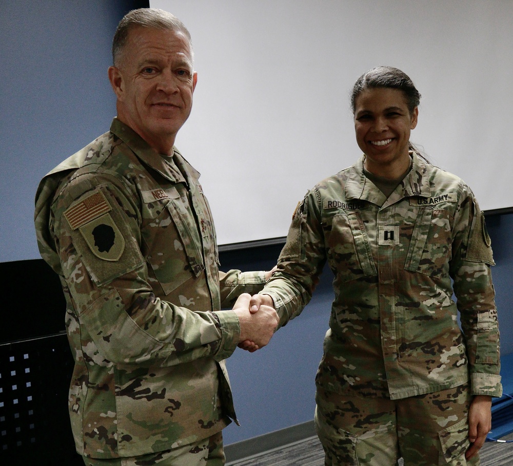 Adjutant General of Illinois 'Coins' Two National Guard Officers at Leader Engagement