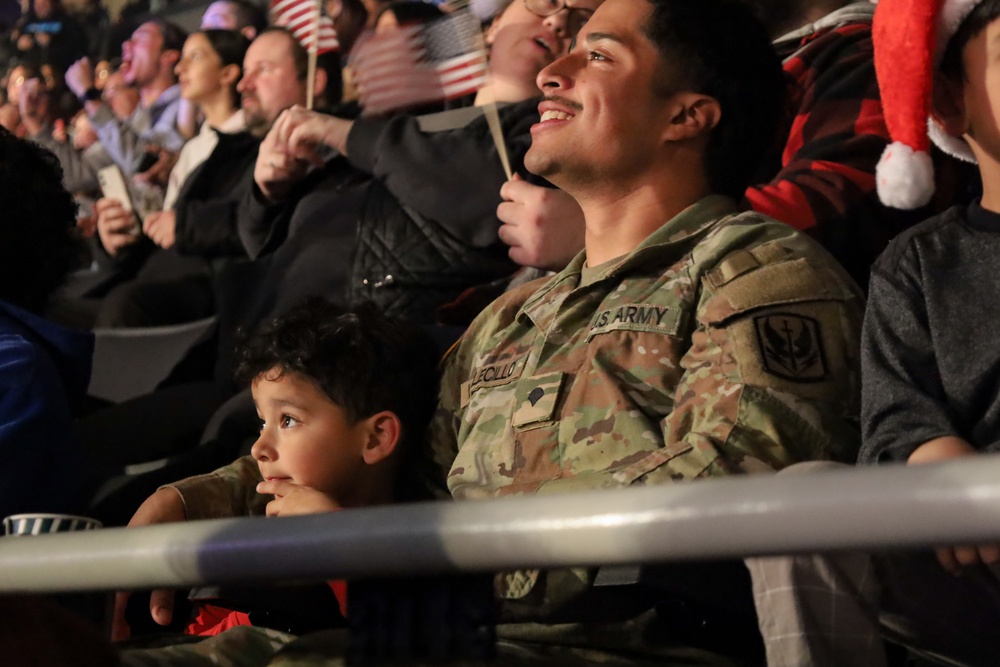 Soldier and Son Attend Professional Wrestling Event Honoring Troops in Providence