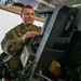 Siblings sharing in service: DC Air National Guard brothers inspect an F-16