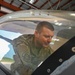 Siblings sharing in service: DC Air National Guard brothers inspect an F-16