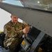 Siblings sharing in service: DC Air National Guard brothers inspect an F-16