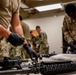 920th Airmen clean weapons