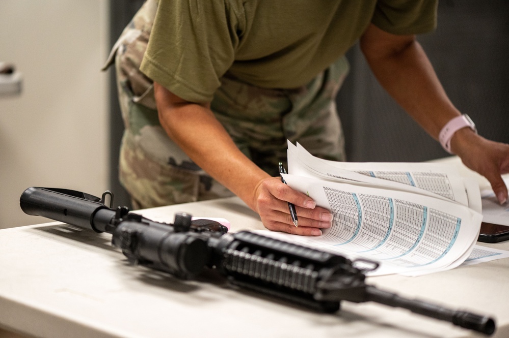 920th Airmen clean weapons