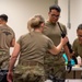 920th Airmen clean weapons