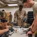 920th Airmen clean weapons