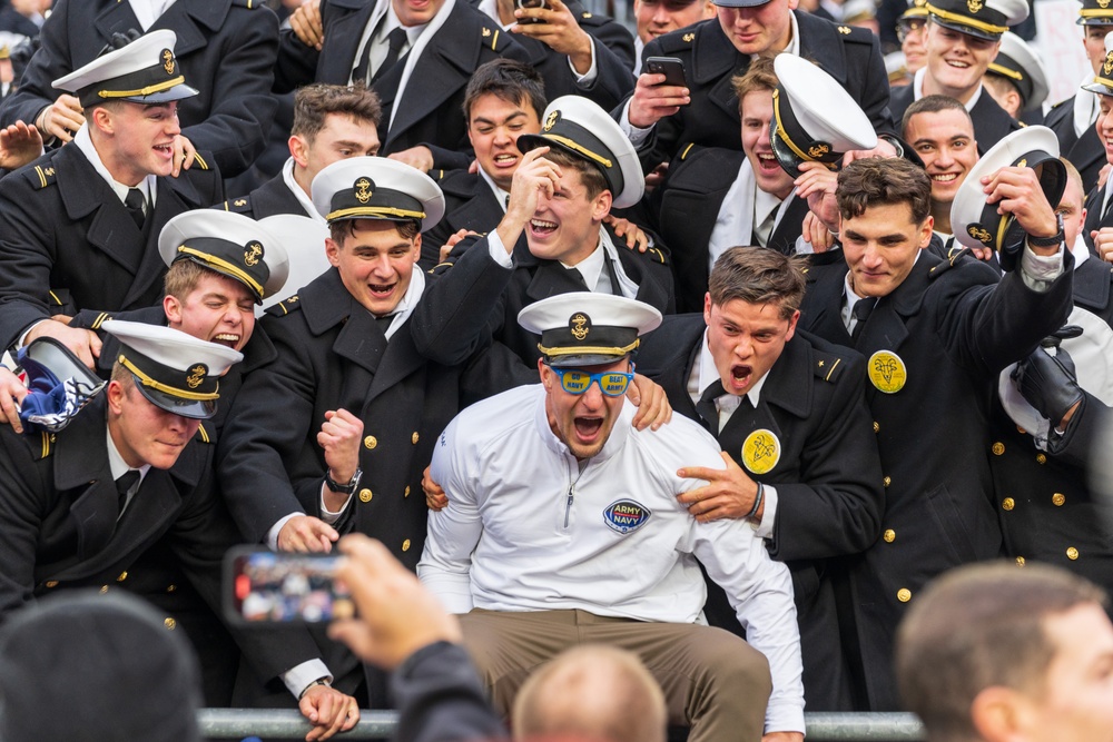 Cadets from the U.S. Naval Academy watch the 124th Army Navy football game