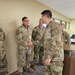 Staff Sgt. Michael Hairston receives a Commander's Coin of Excellence