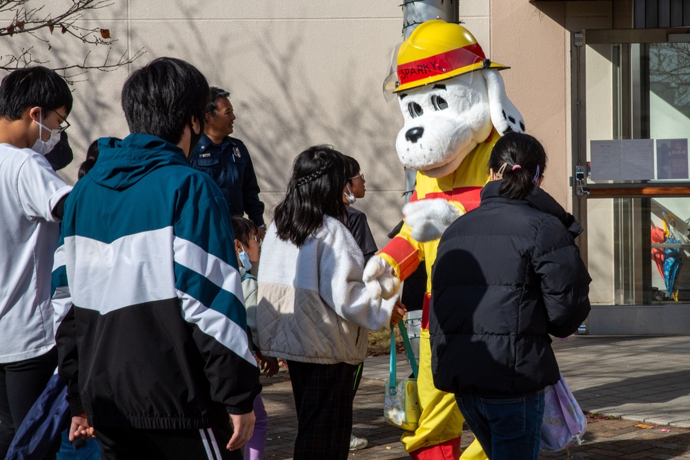 Spreading Holiday Cheer: Marine Corps Air Station Iwakuni Chapel hosts a community relations event inviting Local Orphanage