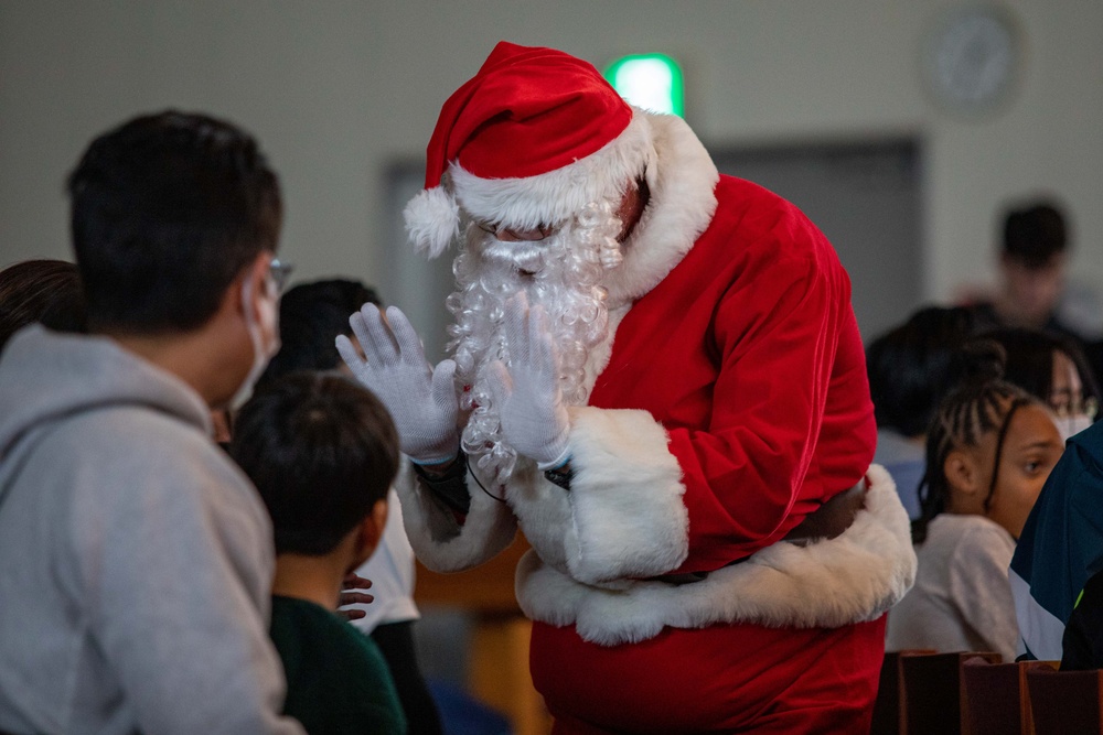 Spreading Holiday Cheer: Marine Corps Air Station Iwakuni Chapel hosts a community relations event inviting Local Orphanage