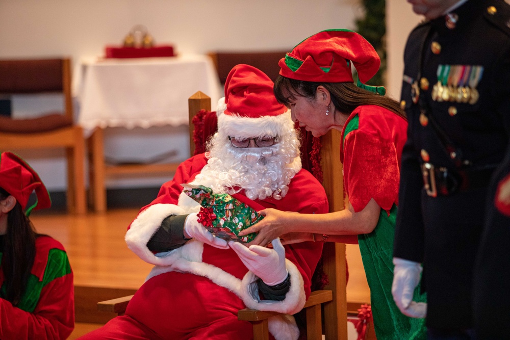 Spreading Holiday Cheer: Marine Corps Air Station Iwakuni Chapel hosts a community relations event inviting Local Orphanage