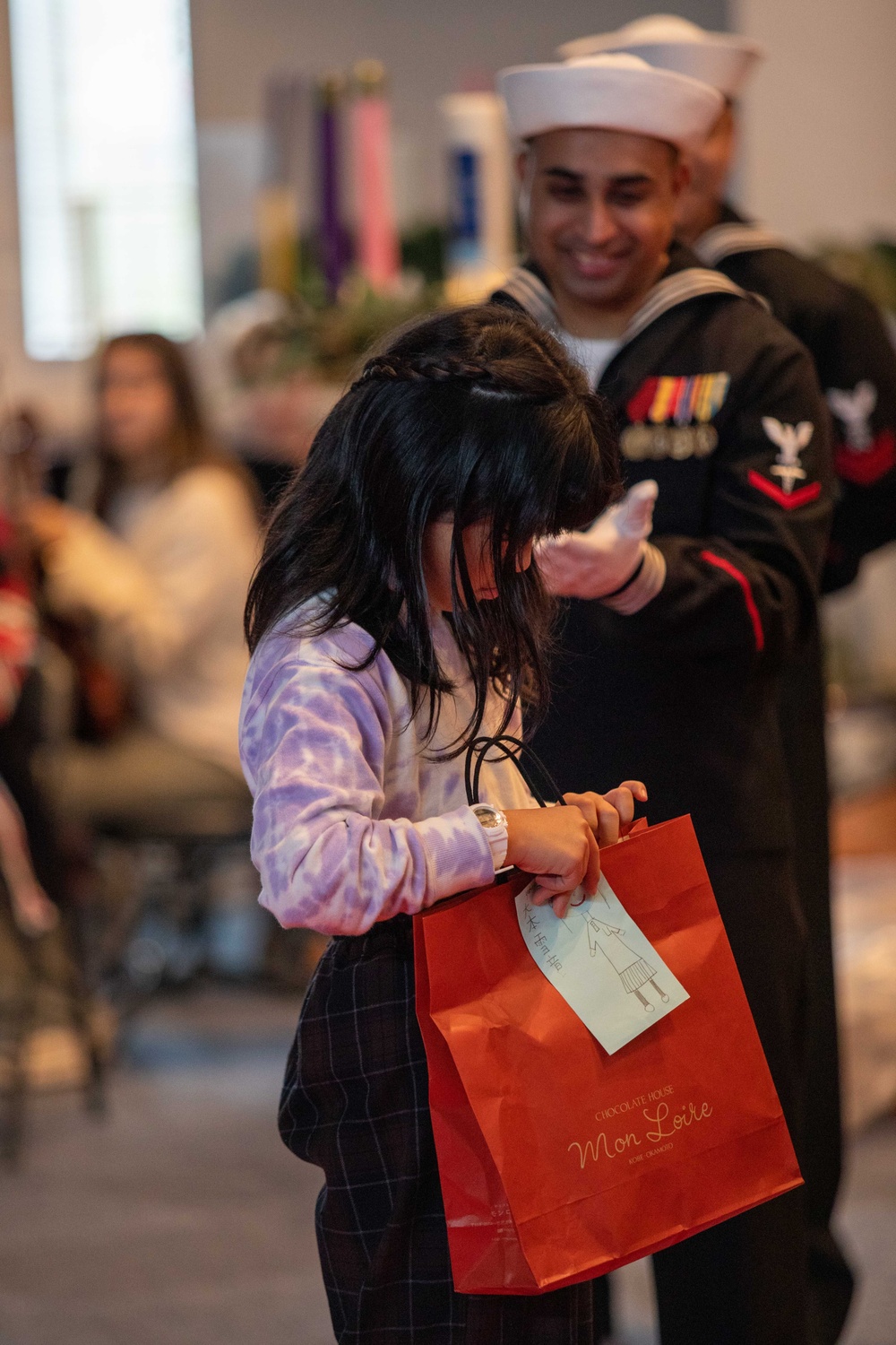 Spreading Holiday Cheer: Marine Corps Air Station Iwakuni Chapel hosts a community relations event inviting Local Orphanage