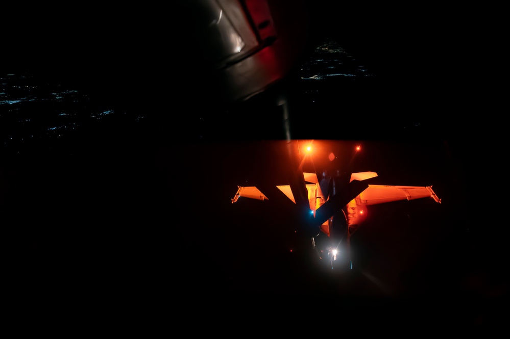 U.S. Navy F/A-18 Super Hornet refuels at night